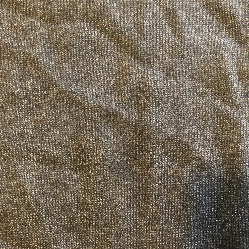 Pre-loved Chanel sparkly gray hoodie in size 44!